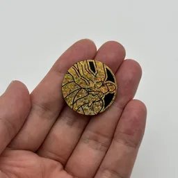 In hand, from Pokémon Coin Fan, full size