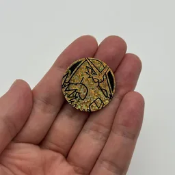 In hand, from Pokémon Coin Fan, full size