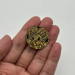 In hand, from Pokémon Coin Fan, full size