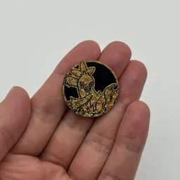 In hand, from Pokémon Coin Fan, full size