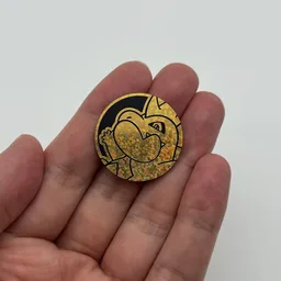 In hand, from Pokémon Coin Fan, full size