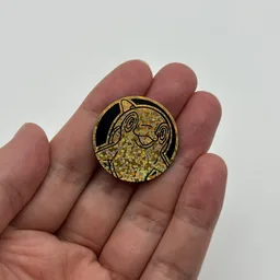 In hand, from Pokémon Coin Fan, full size