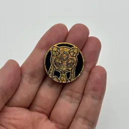 In hand, from Pokémon Coin Fan, full size