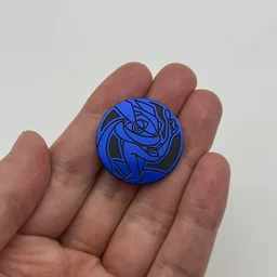 In hand, from Pokémon Coin Fan, full size