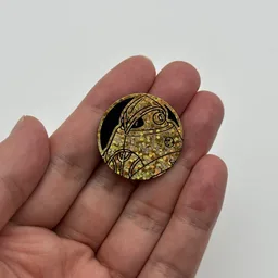 In hand, from Pokémon Coin Fan, full size