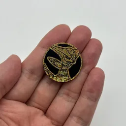 In hand, from Pokémon Coin Fan, full size