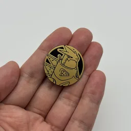 In hand, from Pokémon Coin Fan, full size