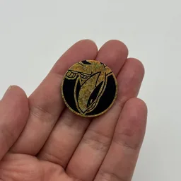In hand, from Pokémon Coin Fan, full size