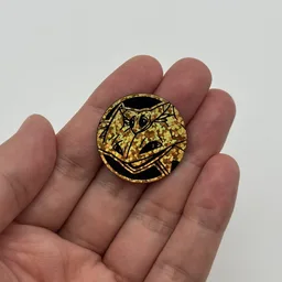 In hand, from Pokémon Coin Fan, full size