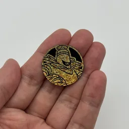 In hand, from Pokémon Coin Fan, full size