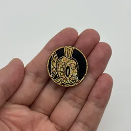 In hand, from Pokémon Coin Fan, full size