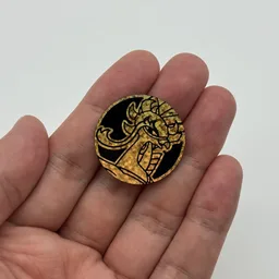 In hand, from Pokémon Coin Fan, full size
