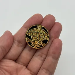 In hand, from Pokémon Coin Fan, full size