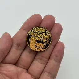 In hand, from Pokémon Coin Fan, full size