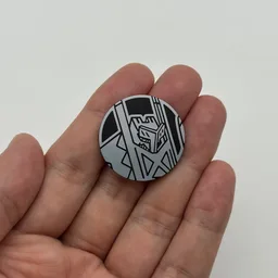 In hand, from Pokémon Coin Fan, full size