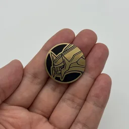 In hand, from Pokémon Coin Fan, full size