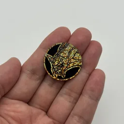 In hand, from Pokémon Coin Fan, full size