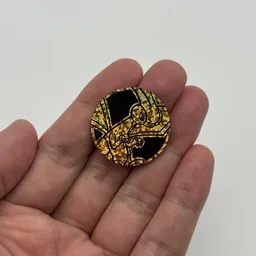 In hand, from Pokémon Coin Fan, full size