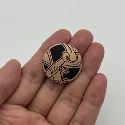 In hand, from Pokémon Coin Fan, full size