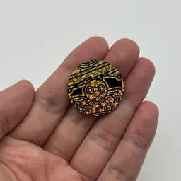 In hand, from Pokémon Coin Fan, full size