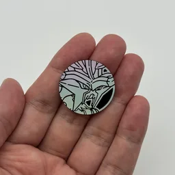 In hand, from Pokémon Coin Fan, full size