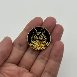 In hand, from Pokémon Coin Fan, full size