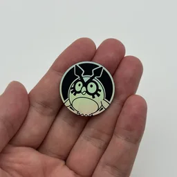 In hand, from Pokémon Coin Fan, full size