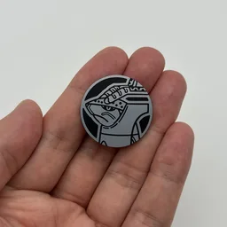 In hand, from Pokémon Coin Fan, full size