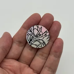 In hand, from Pokémon Coin Fan, full size