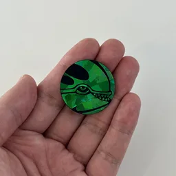 In hand, from Pokémon Coin Fan, full size