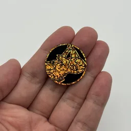 In hand, from Pokémon Coin Fan, full size