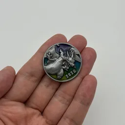 In hand, from Pokémon Coin Fan, full size
