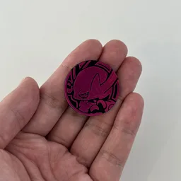 In hand, from Pokémon Coin Fan, full size
