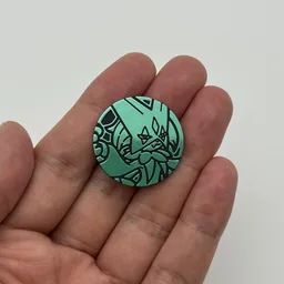 In hand, from Pokémon Coin Fan, full size