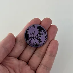 In hand, from Pokémon Coin Fan, full size