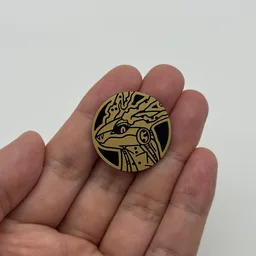 In hand, from Pokémon Coin Fan, full size