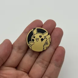 In hand, from Pokémon Coin Fan, full size