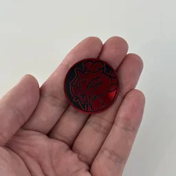 In hand, from Pokémon Coin Fan, full size