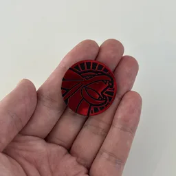 In hand, from Pokémon Coin Fan, full size