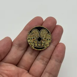 In hand, from Pokémon Coin Fan, full size