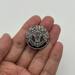 In hand, from Pokémon Coin Fan, full size