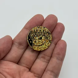 In hand, from Pokémon Coin Fan, full size