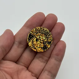 In hand, from Pokémon Coin Fan, full size
