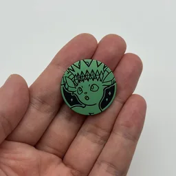 In hand, from Pokémon Coin Fan, full size