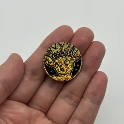 In hand, from Pokémon Coin Fan, full size
