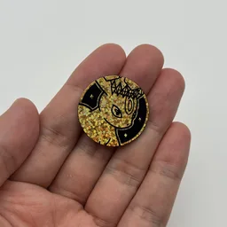 In hand, from Pokémon Coin Fan, full size