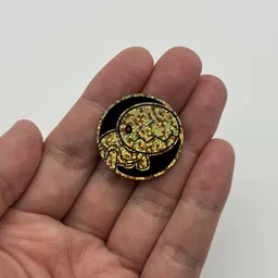 In hand, from Pokémon Coin Fan, full size