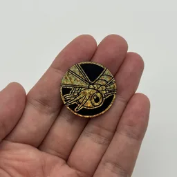In hand, from Pokémon Coin Fan, full size
