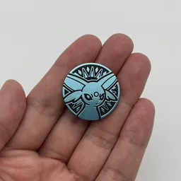 In hand, from Pokémon Coin Fan, full size