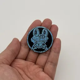In hand, from Pokémon Coin Fan, full size